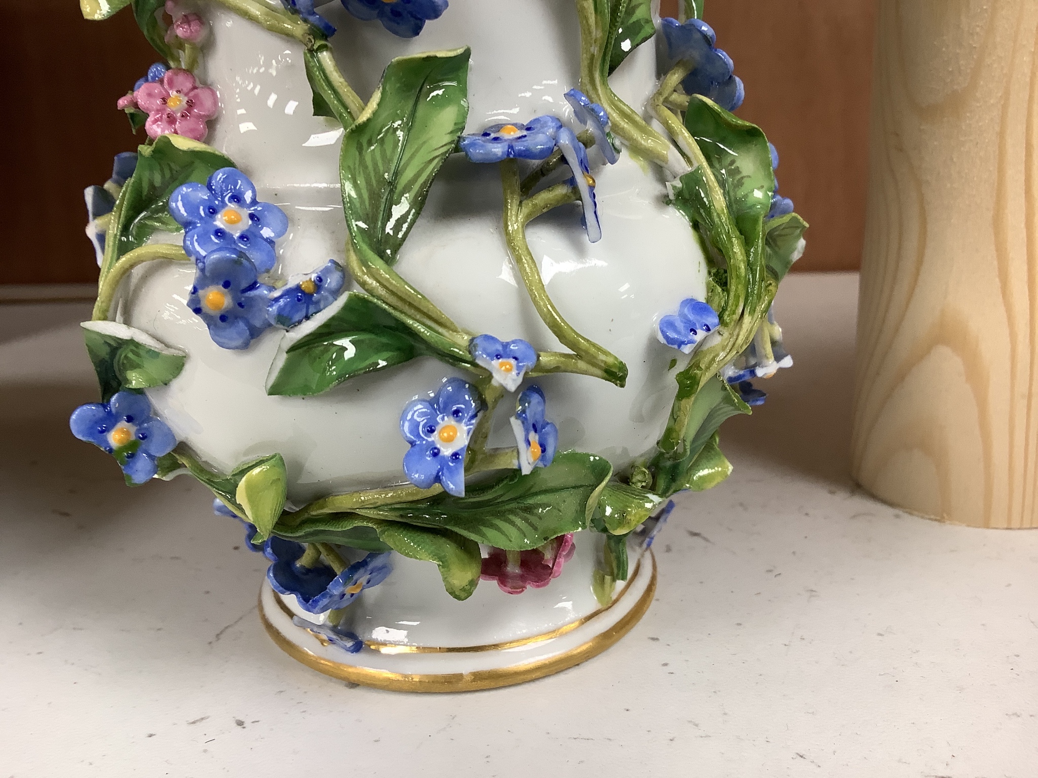 Two similar 19th century Meissen pot pourri vases and one cover, tallest 20cm